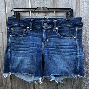 Stretchy dark wash distressed jean shorts